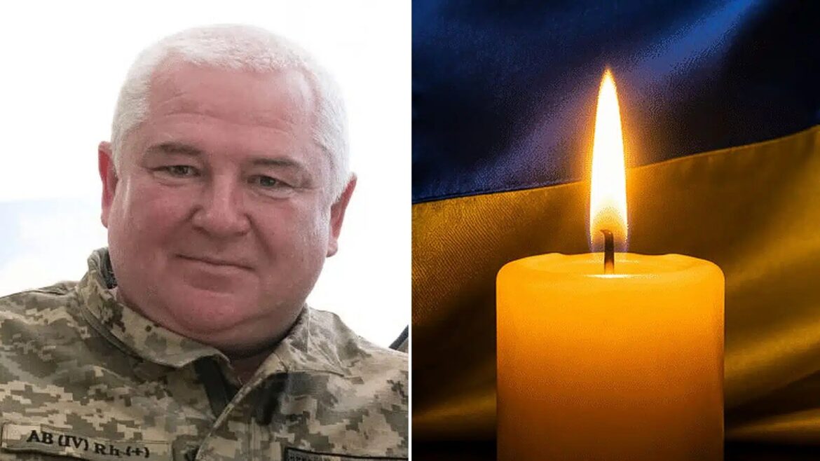 Командир взводу добровольчого формування в військовій формі та запалена свічка як символ пам'яті про загиблого